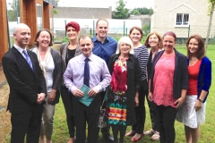 Tomas O’Ruiarc (on the left) from the Teaching Council congratulates locals